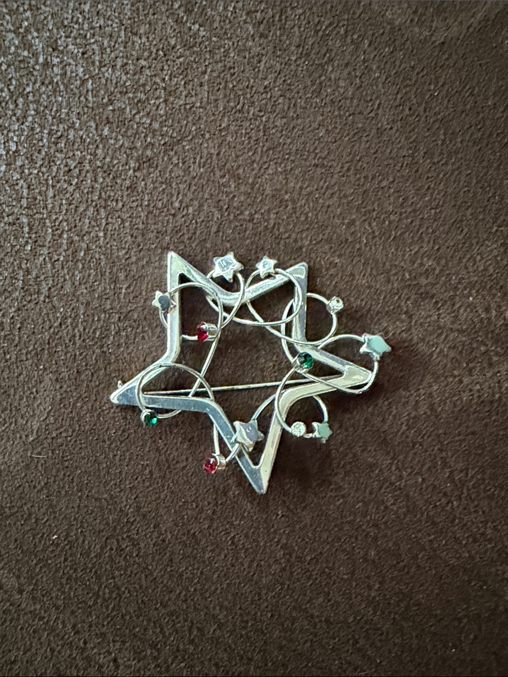 Silver Star Brooch with Red and Green Accents